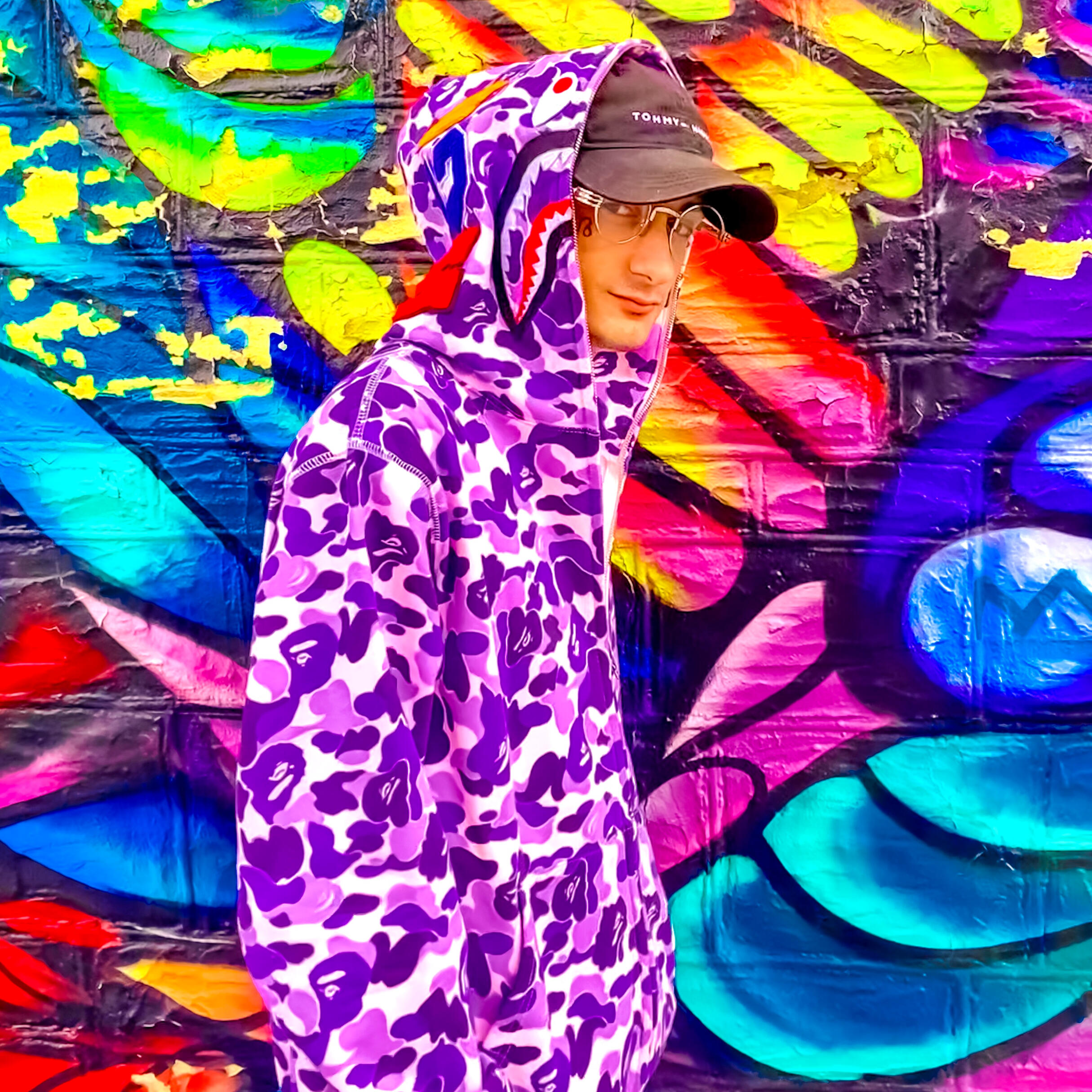 Jay Honest in a purple Bape sweater